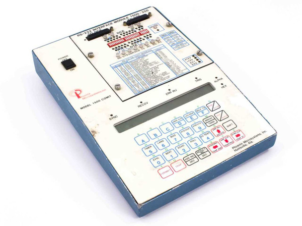 Phoenix Microsystems 1500-250 RS-232 Interface Module – top/front view showing keypad, LCD display, and signal indicator panel