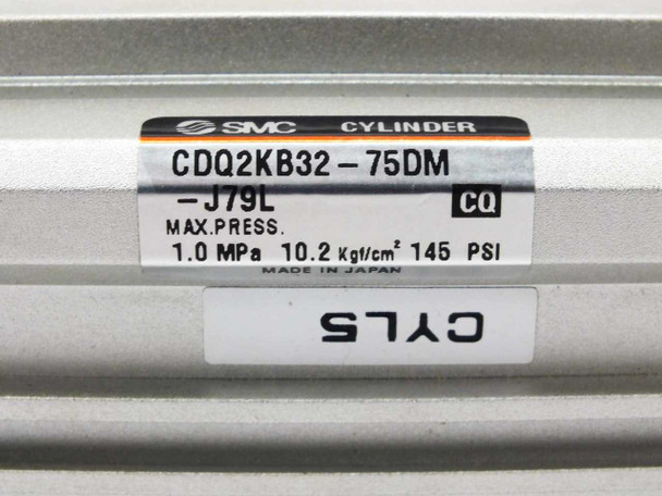 SMC CDQ2KB32-75DM label closeup — model number, J79L suffix, 1.0 MPa 10.2 Kgf/cm² 145 PSI max pressure, Made in Japan