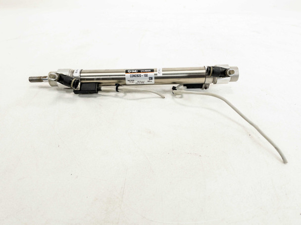 SMC CDM2B20-150 double acting pneumatic cylinder full side view with position sensor leads and speed controller fitting