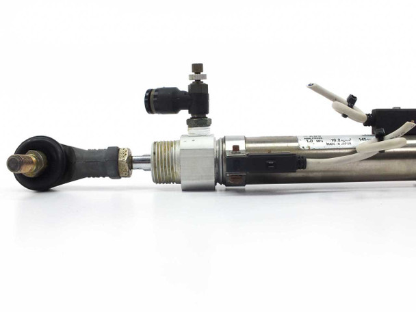SMC CDM2C20-80 cylinder – rod eye / clevis end closeup showing push-in fitting, auto-switch sensor mount, and rating plate detail