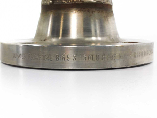 Close-up of large flange edge stamp reading A/SA182 F304/304L B16.5 3 150LB S10S with partial manufacturer marking