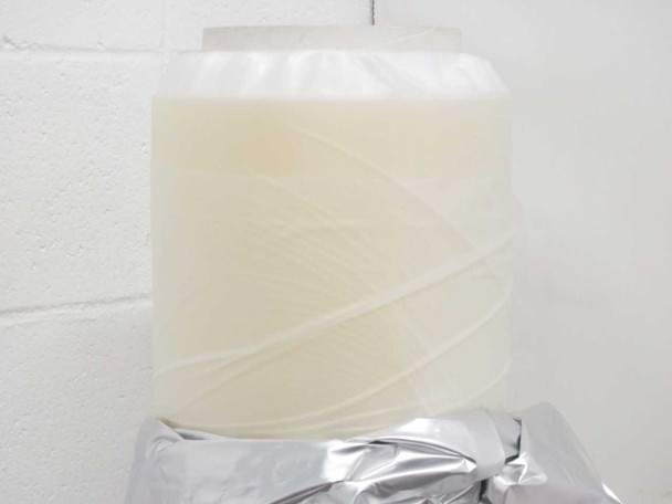 DuPont PV5200 PVB encapsulant sheeting roll showing cream-colored film material partially unwrapped