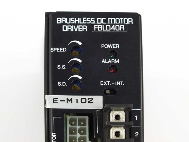 Vexta FBLD40A Brushless DC Motor Driver – close-up front panel showing SPEED, S.S., S.D. adjustment trimpots, POWER and ALARM indicator LEDs, EXT.-INT. toggle switch, and E-M102 label