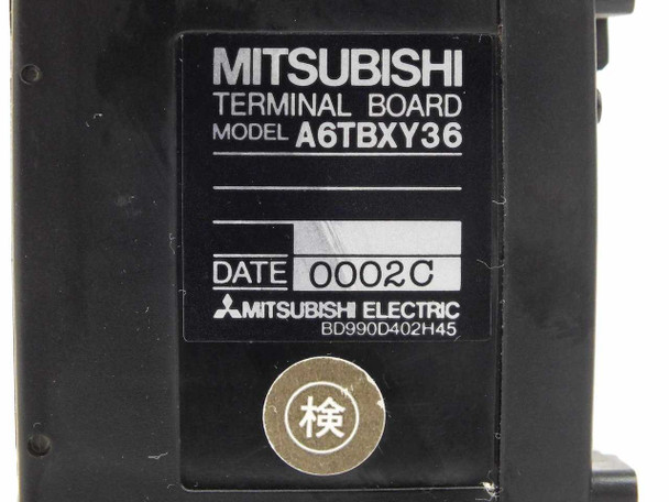Mitsubishi A6TBX36 Terminal Board – close-up of label showing model A6TBXY36, date code 0002C, Mitsubishi Electric