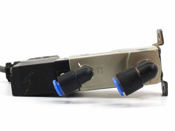 SMC VNA111A side profile showing push-in elbow fittings and solenoid mounting detail