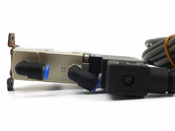 SMC VNA111A lateral view showing valve body, solenoid operator connection, and bracket mount