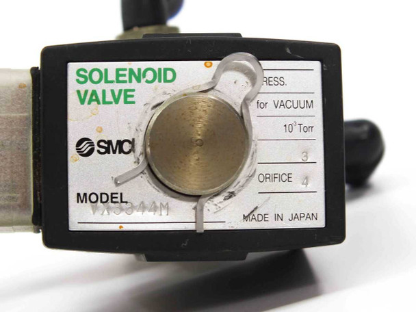 SMC VX3344M solenoid valve label closeup — model number, vacuum rating, Made in Japan markings visible
