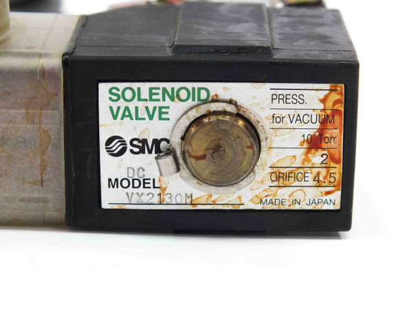 SMC VX2130M solenoid valve label showing model, vacuum pressure rating, orifice 4.5, DC, Made in Japan