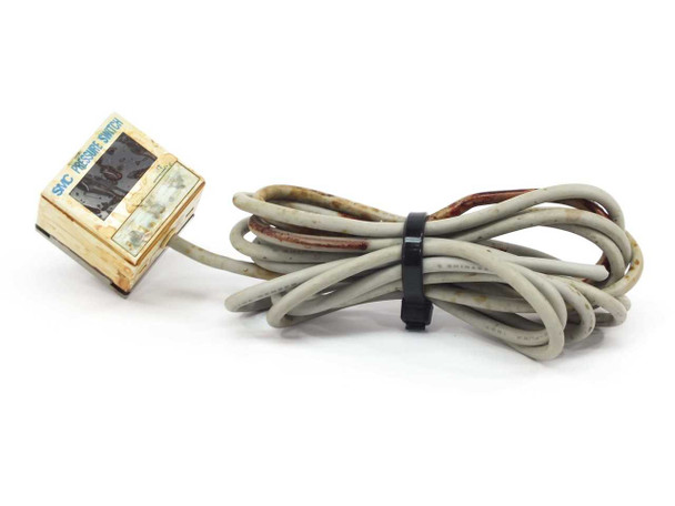 SMC ZSE4E-01-27 vacuum pressure switch front view showing SMC label and attached gray cable bundled with tie wrap