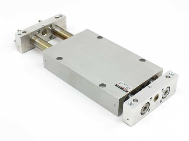 SMC CDPXWL32-75-J79L linear slide cylinder — three-quarter rear view showing plate mounting body, guide rod assembly, and port block