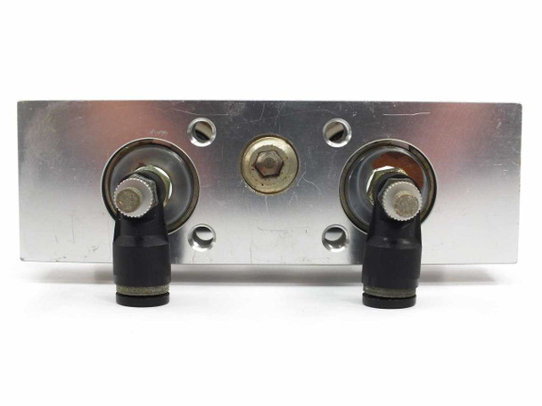 SMC CDPXWL32-75-J79L end cap view showing two push-in pneumatic fittings and central port