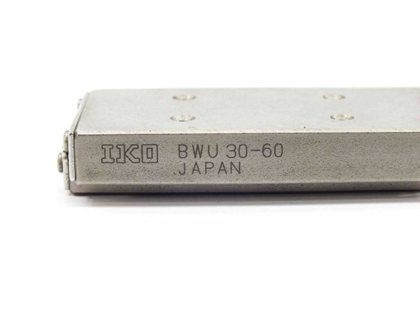 IKO BWU30-60 linear slide table — close-up of side label reading IKO BWU 30-60 Japan