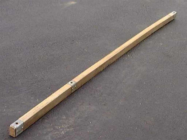 US Tucker military ridge tent pole angled view showing natural wood construction, metal corner caps at both ends, and mounting holes