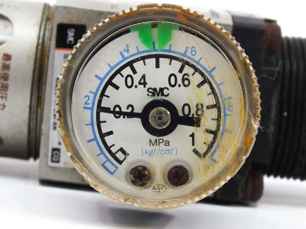 SMC AW2000-02BG-CR pressure gauge close-up showing MPa and kgf/cm² scale face