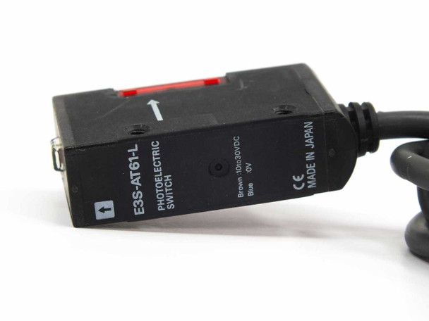 Omron E3S-AT61-L emitter – label detail showing model number, 10-30VDC rating, and Made in Japan marking