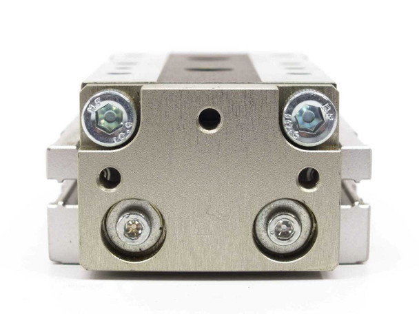 CKD LCG-1230S6D — end view showing two pneumatic port fittings and mounting holes
