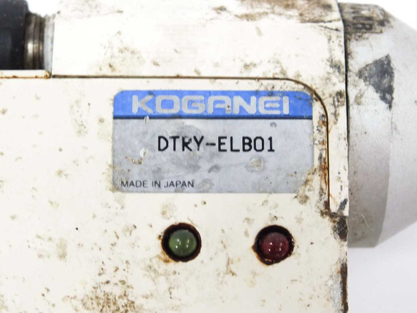 Koganei DTRY-ELB01 label closeup showing model number, brand name, and Made in Japan marking with green and red indicator LEDs