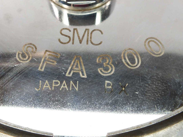 SMC SFA300 Japan BX engraved label – close-up of model and country of manufacture markings on stainless disc body