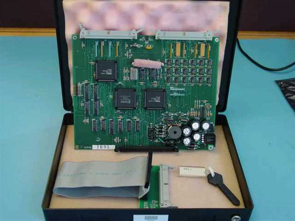 Bell Atlantic MDT-503 SCSI upgrade board in open carry case with flat ribbon SCSI cable and SCSI-1 ROM key visible