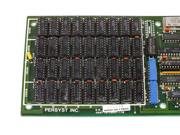 Persyst 12-10057-11B – close-up of DIP memory array section with 'PERSYST INC.' PCB legend and ASSY 12-10057-11B label below chips
