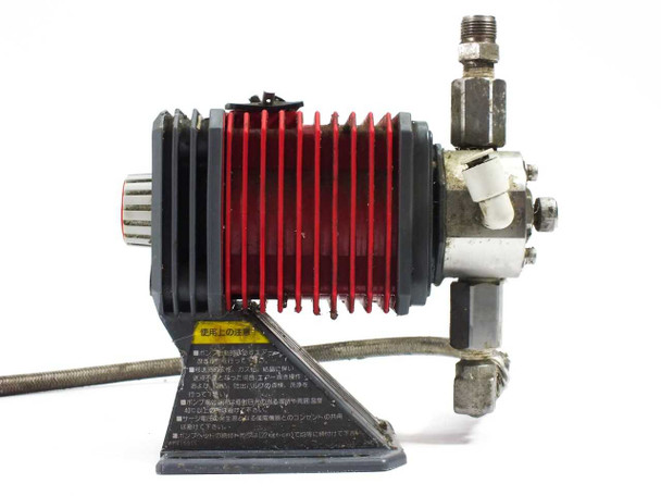 Iwaki EH-C20SH-200R9 metering pump right-side view showing red finned motor housing, pump head assembly, Japanese warning label, and base mount