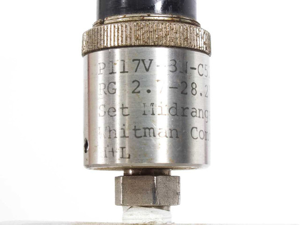 Whitman Controls P117V-3N-C52L vacuum switch label – close-up showing model number P117V-3N-C52L, range 2.7-28.2 inHg, and Whitman Controls marking