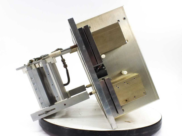 Drytek S100 RF Wafer Power System – right-side exterior view showing brass mounting blocks and machined aluminum enclosure panels