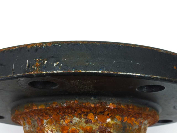 Kerkau A105 pipe flange reducer – close-up of large flange edge showing surface rust, paint wear, and stamped markings