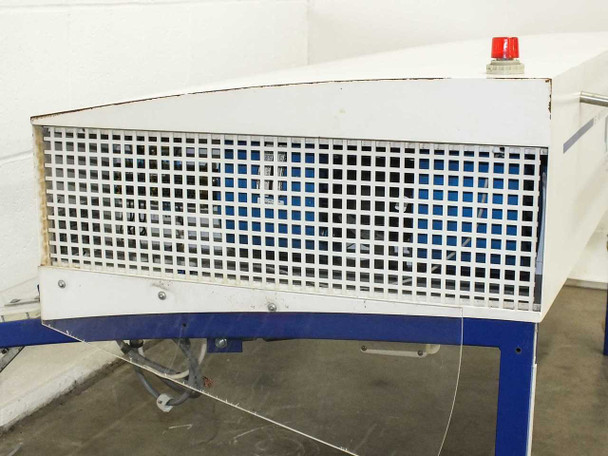 SLEE VLF/M 500-1000 – end view showing air inlet grille with white square-mesh guard, red indicator lamp on top, and blue leg framing