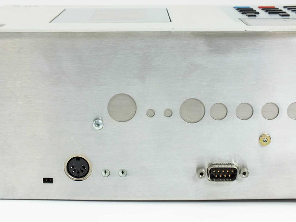 ASC DI 8 side panel showing circular port knockouts, a DIN connector, and a DB-9 serial connector