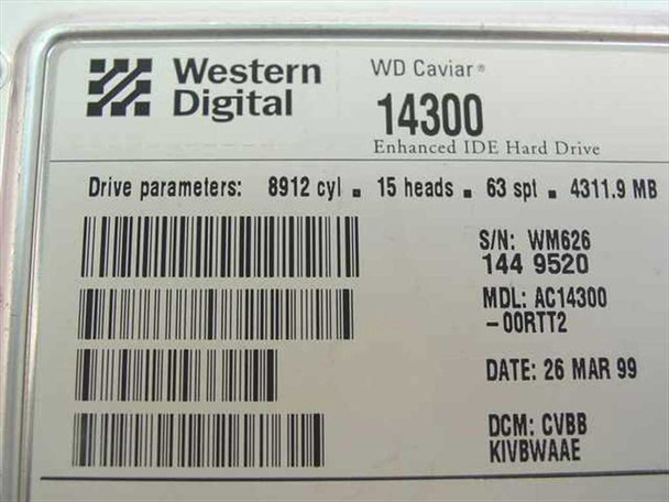 Western Digital AC14300-00RTT2 drive label showing specifications: 8912 cyl, 15 heads, 63 spt, 4311.9MB, date 26 Mar 1999