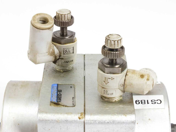 Koganei RANS50-90 top view showing two SMC-style needle valve flow control fittings and quick-connect air ports