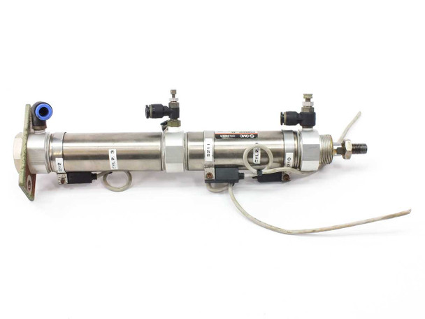 SMC CDM2G32-65-H7BL3 pneumatic cylinder – left-side view showing full cylinder body, flow control fittings, and mounting bracket with rod extended