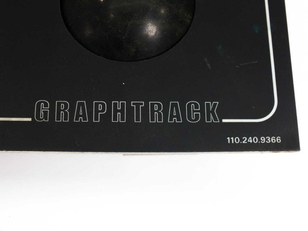 Netstal Graphtrack front panel — close-up of lower-right corner showing GRAPHTRACK nameplate and part number 110.240.9366 with trackball opening