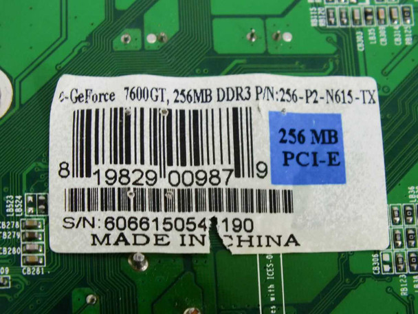 EVGA e-GeForce 7600GT label closeup – showing part number 256-P2-N615-TX, 256MB PCI-E designation, barcode, and Made in China markings