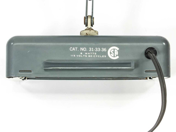 Bausch & Lomb 31-33-36 illuminator – top of lamp head showing Cat. No. 31-33-36 label, 8 Watts 115 Volts 60 Cycles rating plate, and CSA approval mark
