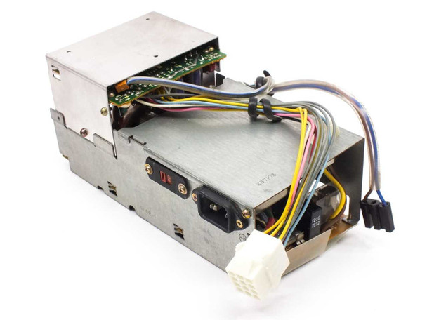 Tektronix 4207 power supply – front view showing IEC AC inlet, cooling vent, multi-pin connector, and wiring harness