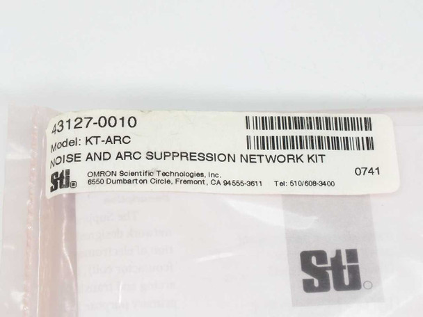 Omron STI KT-ARC label showing part number 43127-0010, model KT-ARC, Noise and Arc Suppression Network Kit, STI Fremont CA