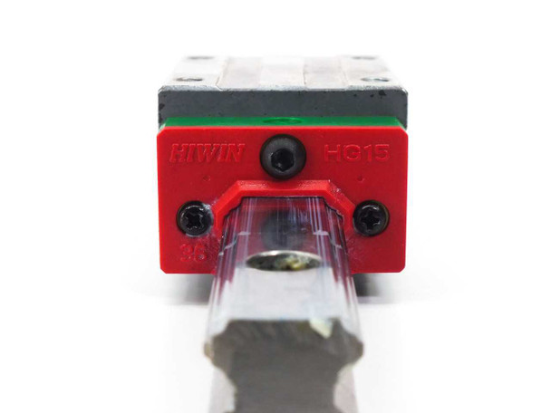 Hiwin HGH15CAH carriage block — end-on front view showing Hiwin and HG15 branding on red end cap with lubrication port and rail profile