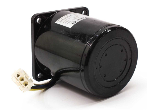 Oriental Motor 5IK40GK-A induction motor — rear three-quarter view showing cylindrical body and 3-pin screw terminal lead wire connector