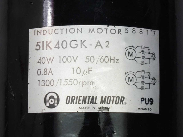 Oriental Motor 5IK40GK-A induction motor — rating plate label showing 5IK40GK-A2, 40W 100V 50/60Hz, 0.8A, 10uF, 1300/1550rpm, Made in Japan