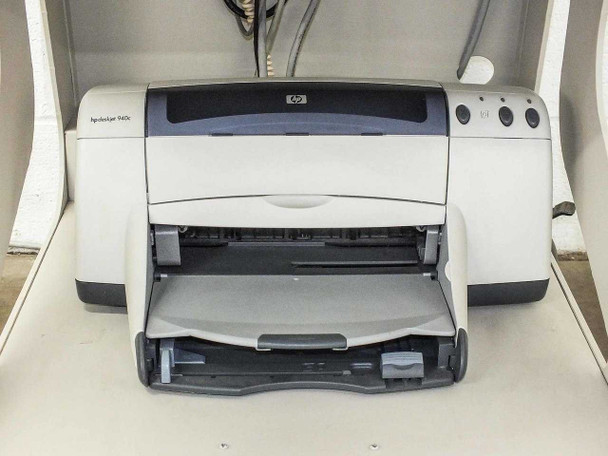 HP DeskJet 940C inkjet printer stored in lower cart enclosure