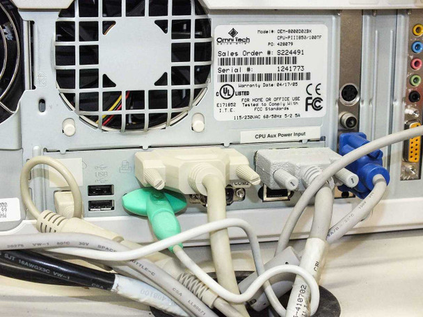 Omnitech CPU rear label closeup — Model DEM-8000D2BK, CPU P-III/850-1007T, 115-230VAC 60/50Hz 5-2.5A, Sales Order S224491