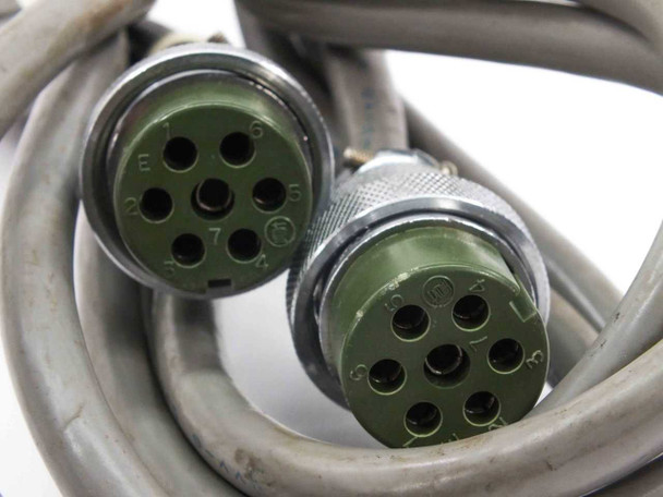 Tokyo Foton TFL 150 cable — close-up of both 8-pin circular connector faces side by side showing pin layout and green inserts