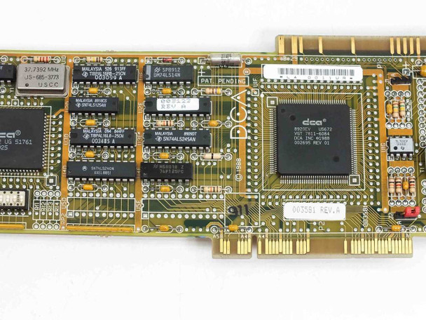DCA IRMA III 003581 PCB wide close-up showing DCA controller, crystal oscillator, and logic ICs