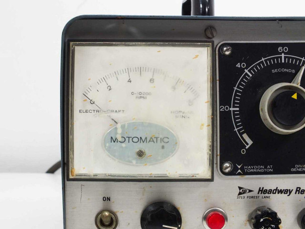Headway Research EC100A close-up of Motomatic Electro-Craft tachometer meter face showing 0-10000 RPM scale and timer dial detail