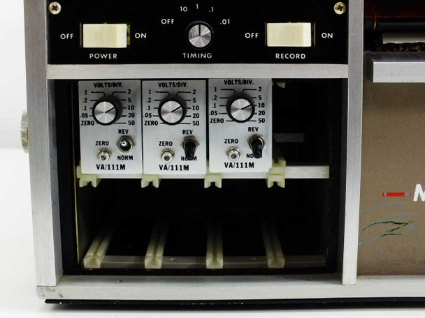 MCR308BTD0X channel module close-up — three VA/111M modules each with Volts/Div selector, Zero knob, REV toggle, and NORM/ZERO switch; power and timing controls above
