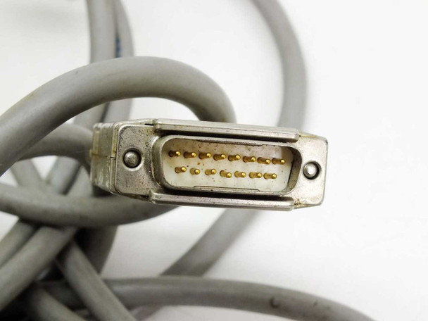 DB15 15-pin male connector close-up on end of gray interface cable