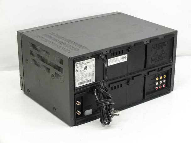Go Video GV-6060 dual VHS VCR — rear panel showing RCA composite video/audio ports, RF connectors, power cord, and rating label