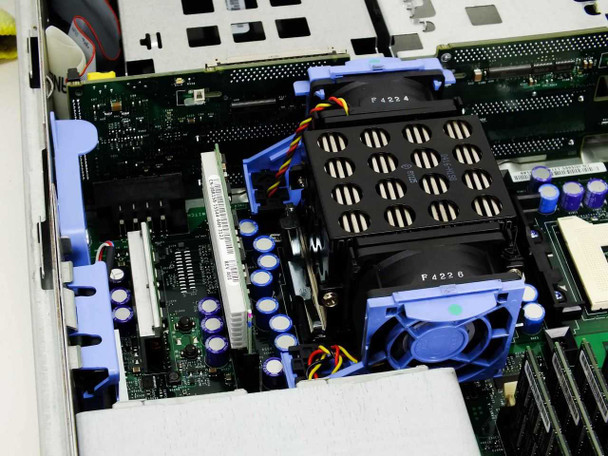 Dell PowerEdge 2650 – interior close-up showing Intel Xeon processor with heatsink and cooling fan assembly on motherboard